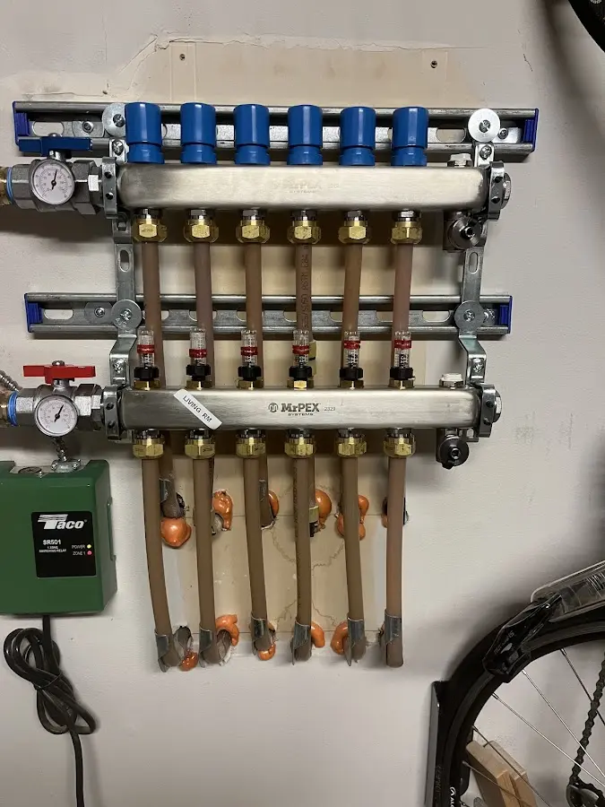 Plumber performing Water Heater Repair at a residential property in Waterloo